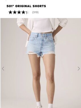 Levi's Light Blue Distressed Denim Shorts